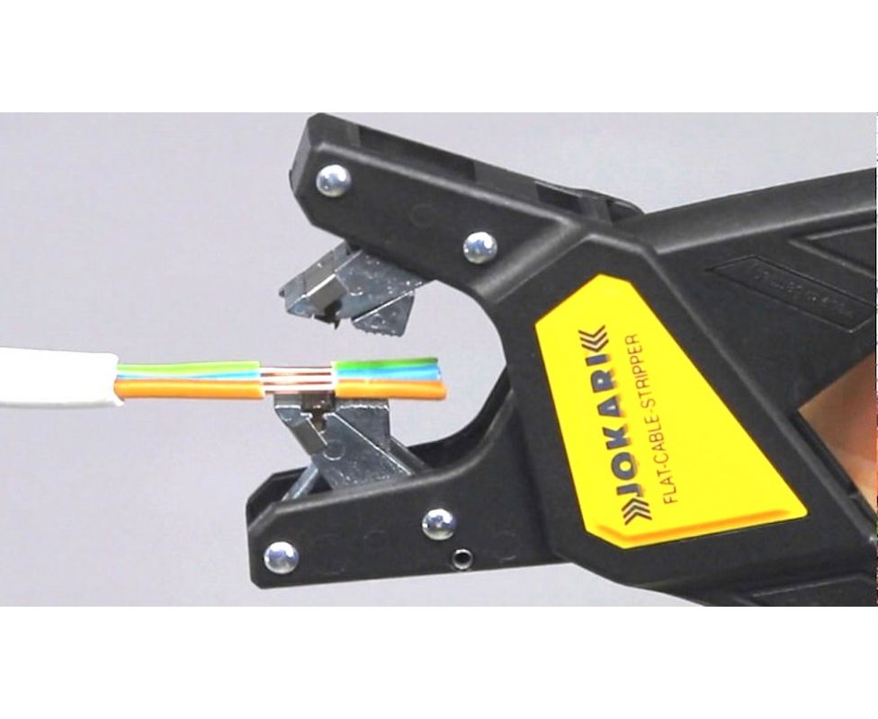 картинка Клещи Flat-Cable-Stripper для снятия изоляции с плоских кабелей Jokari JK 20030 от магазина "Элит-инструмент"
