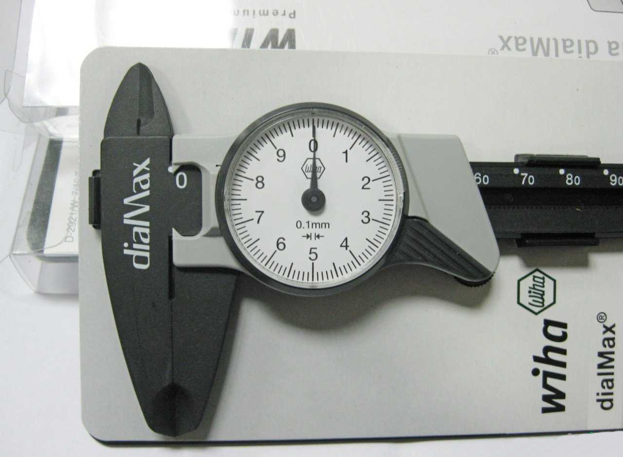 картинка Штангенциркуль часовой Wiha dialMax 411 210 2 27082 точность 0.1 мм Wiha 27082 от магазина "Элит-инструмент"