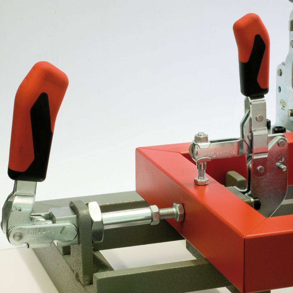 картинка Шарнирный зажим двухтактного типа с красной ручкой АМF 93922 от магазина "Элит-инструмент"