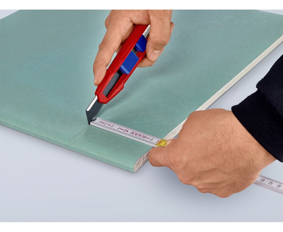 картинка KNIPEX CutiX Нож универсальный, 165 мм, для стандартных отламывающихся лезвий на 18 мм KN-9010165BK от магазина "Элит-инструмент"